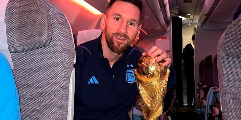 Lionel Messi With The World Cup Trophy